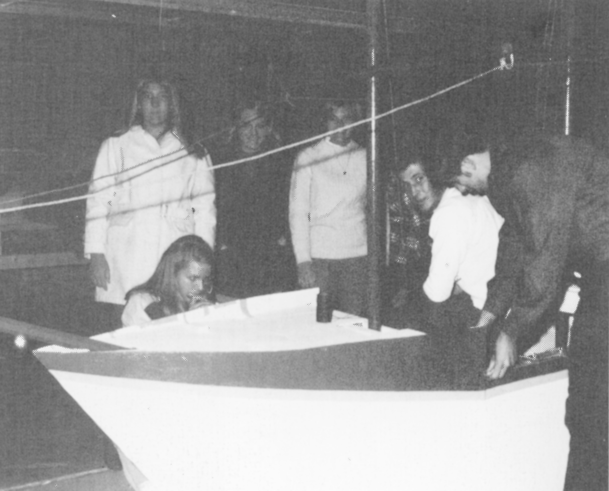 Building the Senior Float in Betsy's garage: ECHOES 1969.  From left - Betsy, Susan Meyers (kneeling), Cheryl Niebur and Linda Bergmeyer in shadows (I think), and Doug Allen in the white shirt. I am not sure who the guy on the right is. Help!