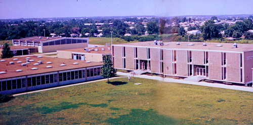 Aerial view of Building 9 and Building 2 in foreground and Cafeteria and Gym in background: ECHOES 1966
